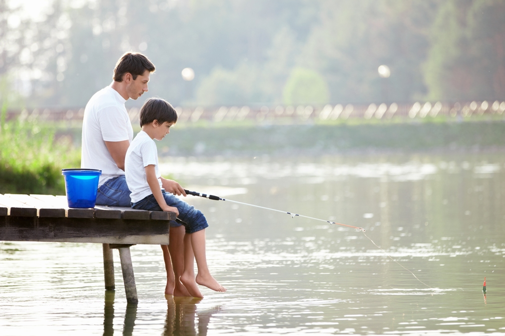 father and son on lake